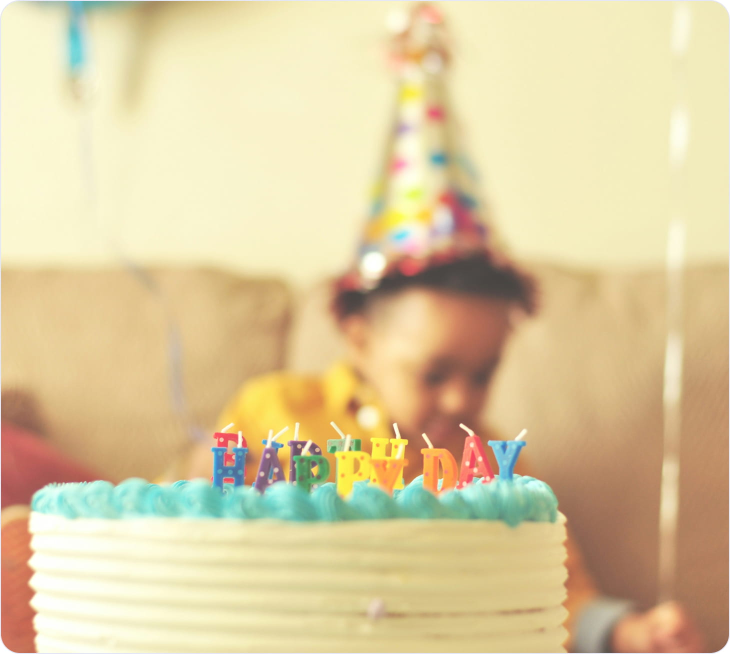 Kid in a composition with a cake