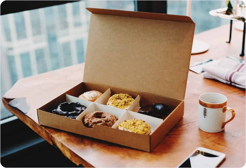 Decorated donuts in a box