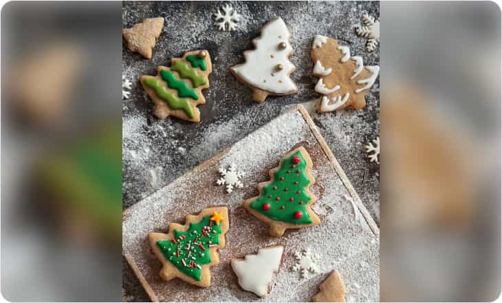 Table with decorated Christmas cookies